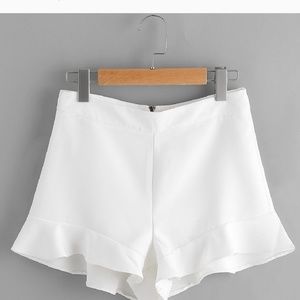 White ruffle shorts. New size medium